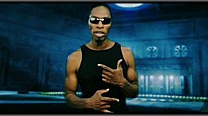 A screen shot from its music video. A screen shot from its music video.