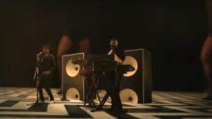 A screen shot from its music video. A screen shot from its music video.