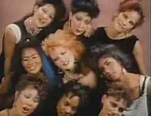 A screen shot from its music video. A screen shot from its music video.