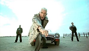 A screen shot from its music video. A screen shot from its music video.