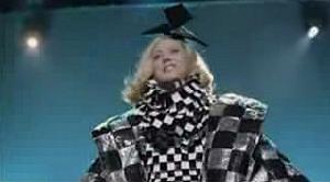 A screen shot from its music video. A screen shot from its music video.