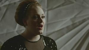 A screen shot from its music video. A screen shot from its music video.