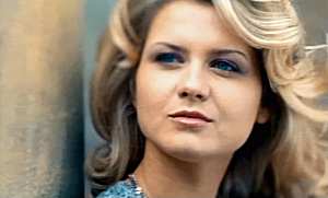 A screen shot from its music video. A screen shot from its music video.